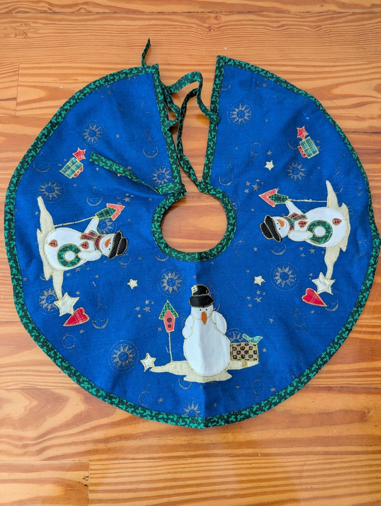 Appliqué Snowman Tree Skirt from Unknown - Holiday Decor (Cotton Fabric, Felt, Batting Tree Skirt, Traditional, Folk Art, Blue, Green, White)