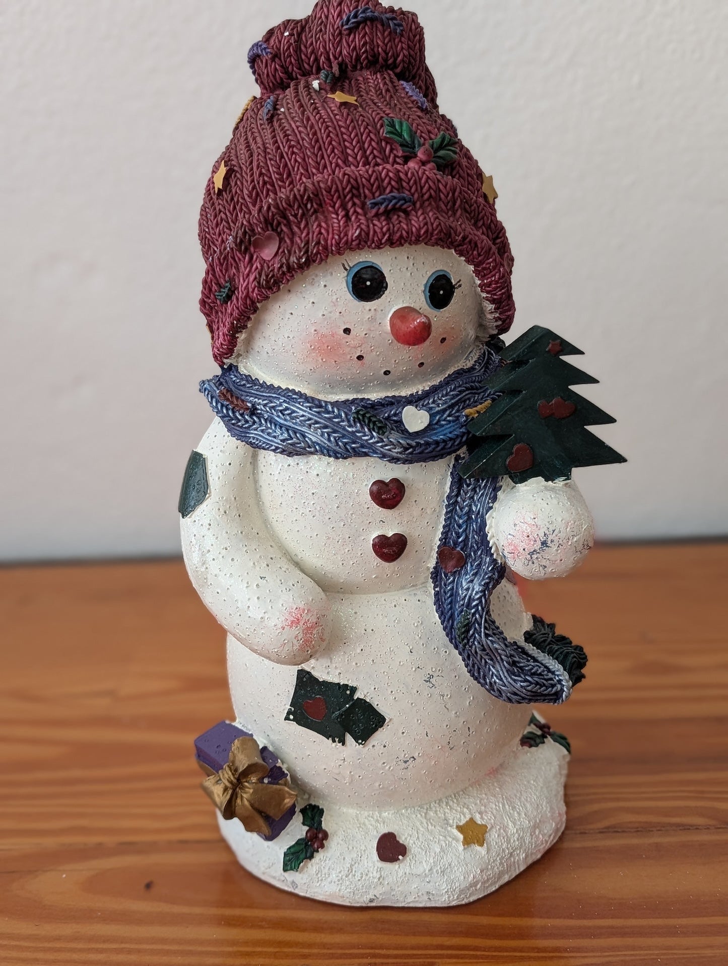 Snowman with Tree and Knit Hat from Unknown - Holiday Decor (Resin Figurine, Whimsical, Collectible, White, Maroon, Blue)