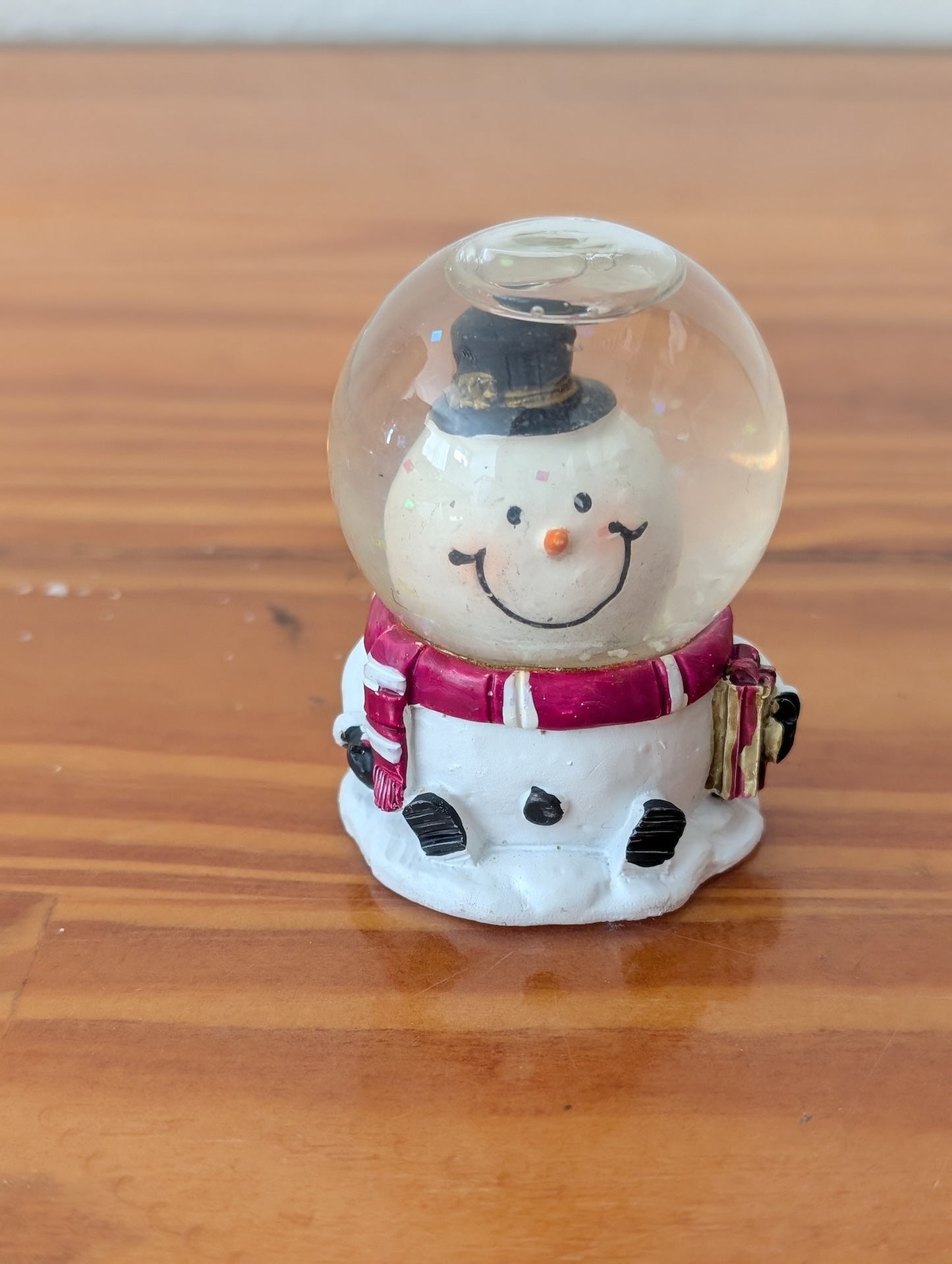 Mini Snowman Snow Globe from Unknown - Holiday Decor (Plastic, Glass, Water, Glitter Snow Globe, Christmas, Holiday, Whimsical, White, Red, Black)