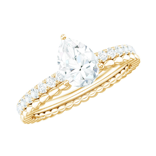 0.7 Carat Pear Cut Moissanite Solitaire Engagement Ring