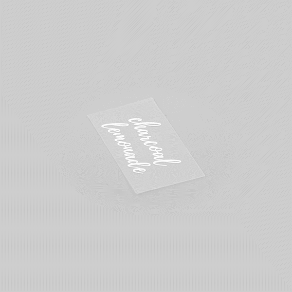 Label Tek Plastic Charcoal Lemonade - Clear with White Font, Water-Resistant - 2" x 1" - 100 count box