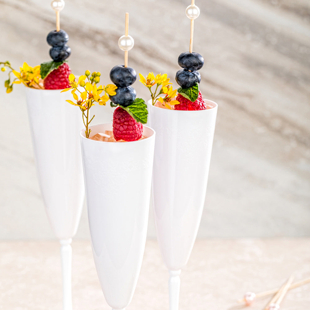 Bev Tek 4 oz White Plastic Wedding Champagne Flute - 1-Piece - 2 1/4" x 2 1/4" x 7 1/2" - 100 count box