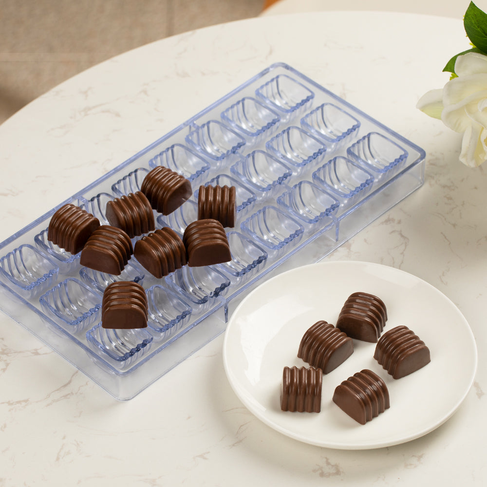 Pastry Tek Polycarbonate Ridged Cylinder Candy / Chocolate Mold - 24-Compartment - 10 count box