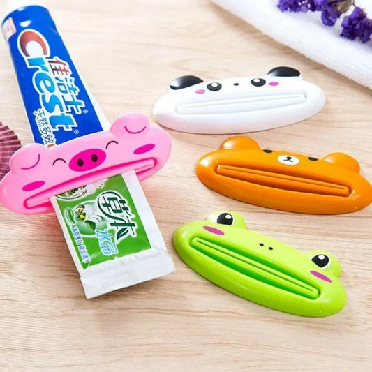 Cartoon Rolling Toothpaste Squeezer Dispenser for Kids – Tube Saver Holder (1.6 x 3.5 in / 4 x 9 cm) – 1 or 2-Pack