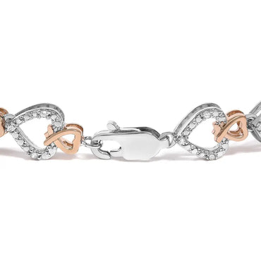 Diamond Infinity Loop & Swirl Link Bracelet in 10K Rose & White Gold – 1/4 Cttw