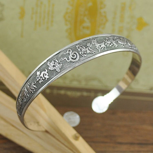 Handcrafted Tibetan Miao Silver Artisan Bracelet for Boho Fashion