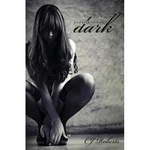 Captive in the Dark: The Dark Duet - Paperback