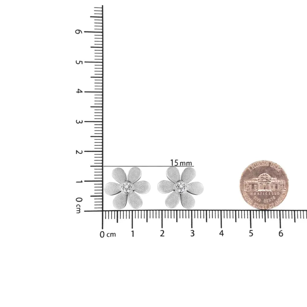 Diamond Flower Stud Earrings in Matte Sterling Silver 1/20 Cttw