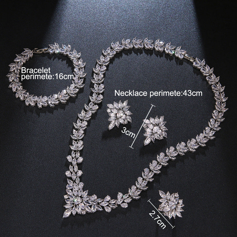 The Dazzling Set Is Handcrafted With Copper And Set With Zircon Stones.