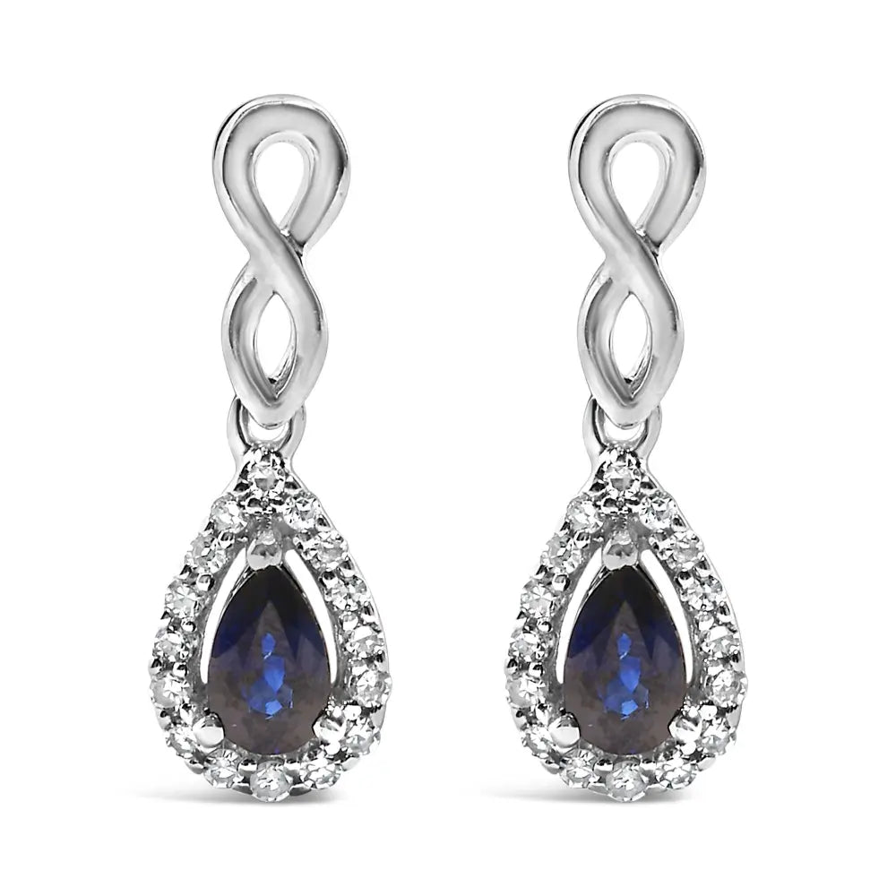 Blue Sapphire and 1/7 CTTW Diamond Infinity Drop Earrings in 10K White Gold