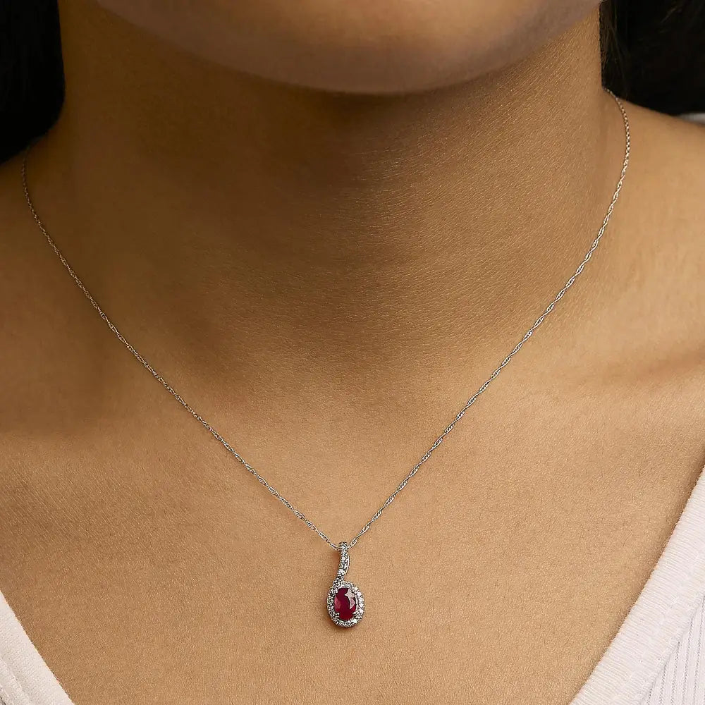 Oval Ruby and Diamond Teardrop Halo Pendant in 10K White Gold 18 Inch