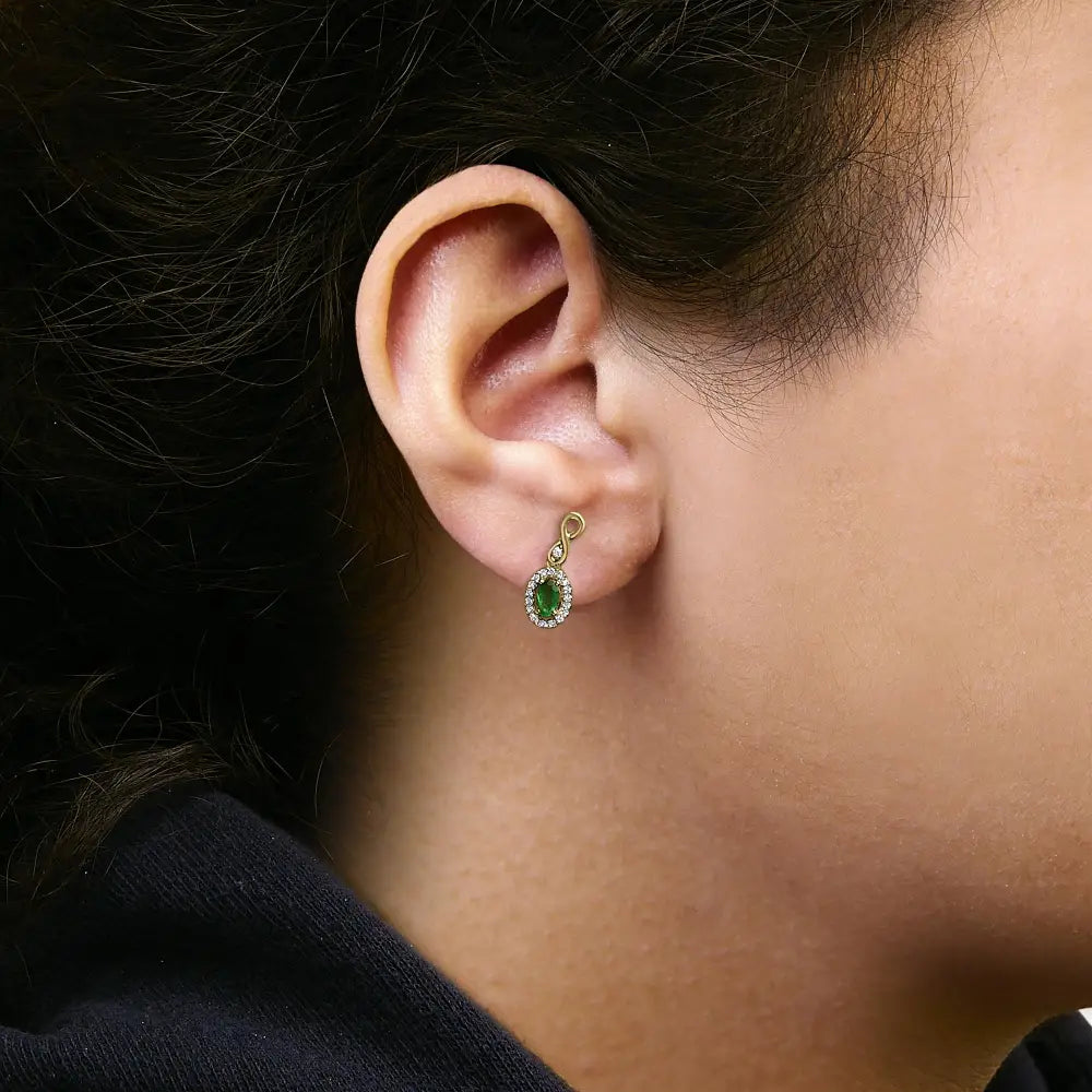 10K Yellow Gold Oval Green Emerald and 1/7 Cttw Diamond Dangle Earrings