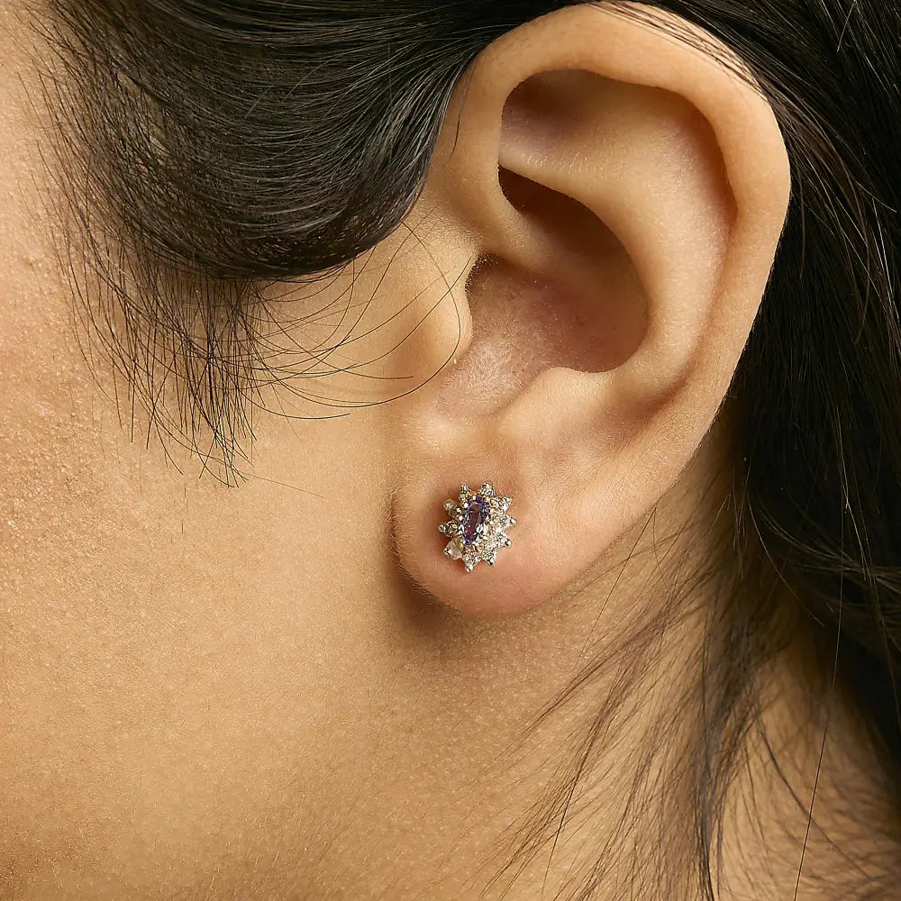 Oval Tanzanite and Diamond Sunburst Stud Earrings in 14K Yellow Gold 1/4 Cttw