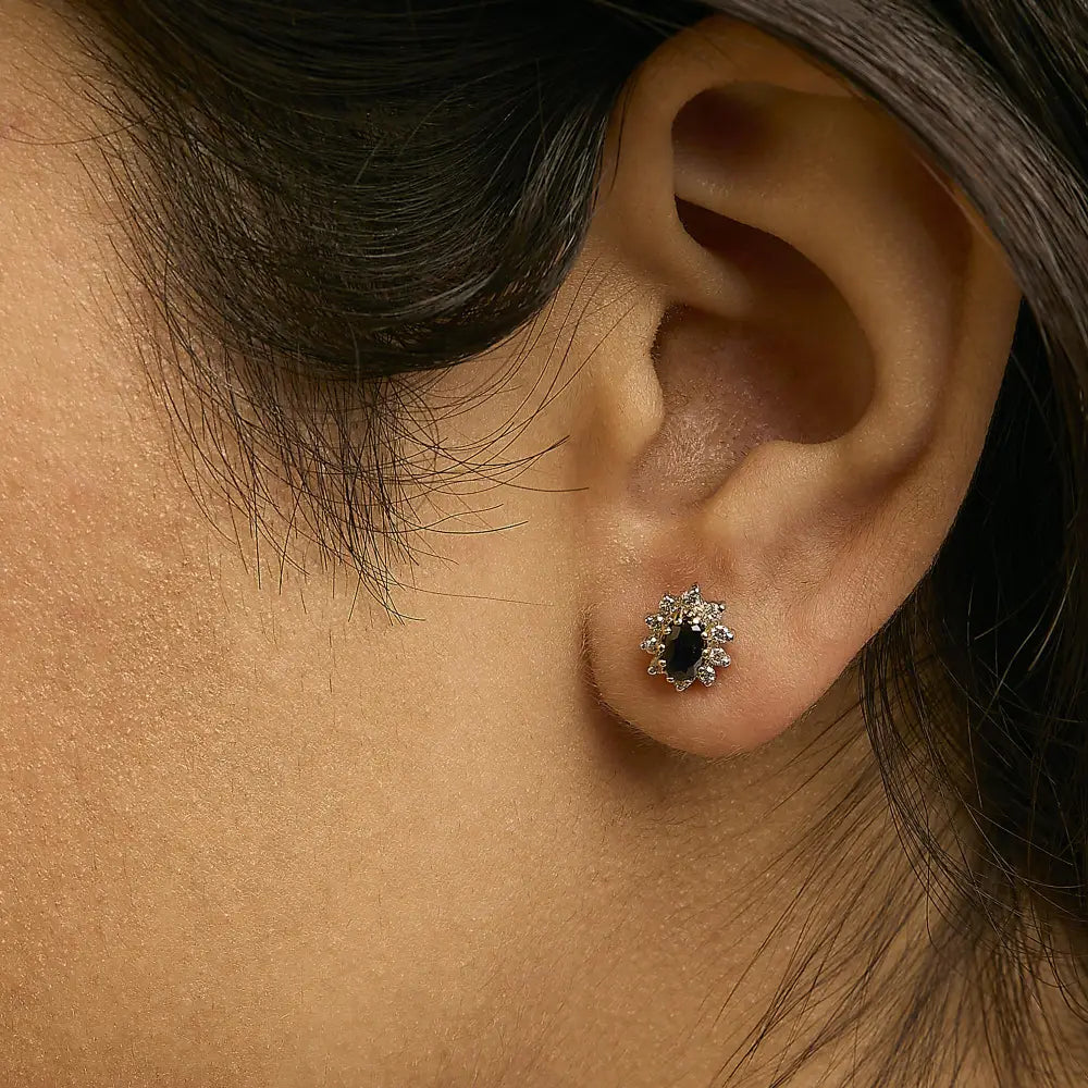 Oval Blue Sapphire and Diamond Sunburst Halo Earrings in 14K Yellow Gold