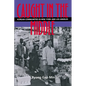 Caught in the Middle: Korean Communities in New York and Los Angeles - Paperback