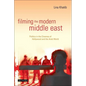 Filming the Modern Middle East: Politics in the Cinemas of Hollywood and the Arab World - Paperback