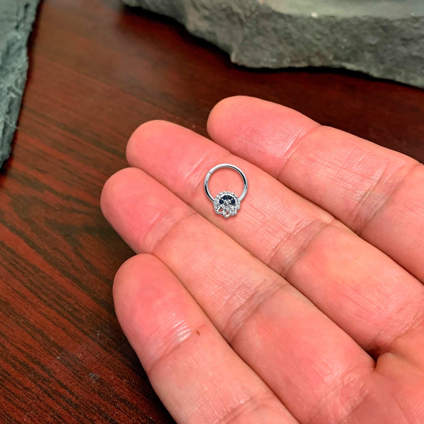 16G 3/8 Clear Blue Gem Abstract Arch Hinged Segment Ring