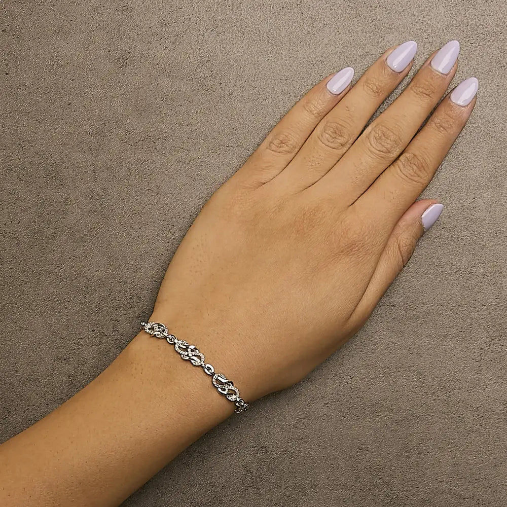 1.0 CTTW Diamond Infinity Swirl Link Bracelet in .925 Sterling Silver