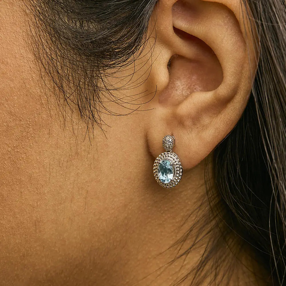 Oval Blue Topaz and Diamond Beaded Double Halo Drop Earrings in Silver