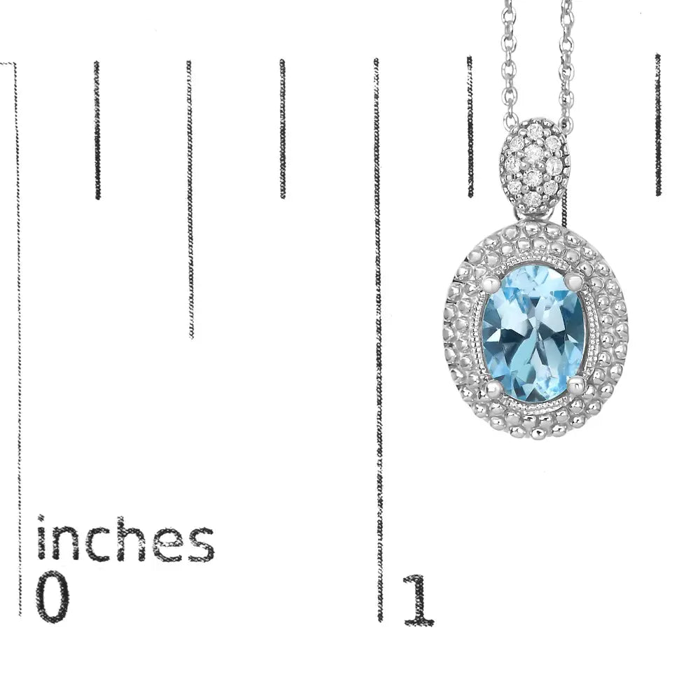 Oval Blue Topaz and Diamond Beaded Halo Pendant in Sterling Silver