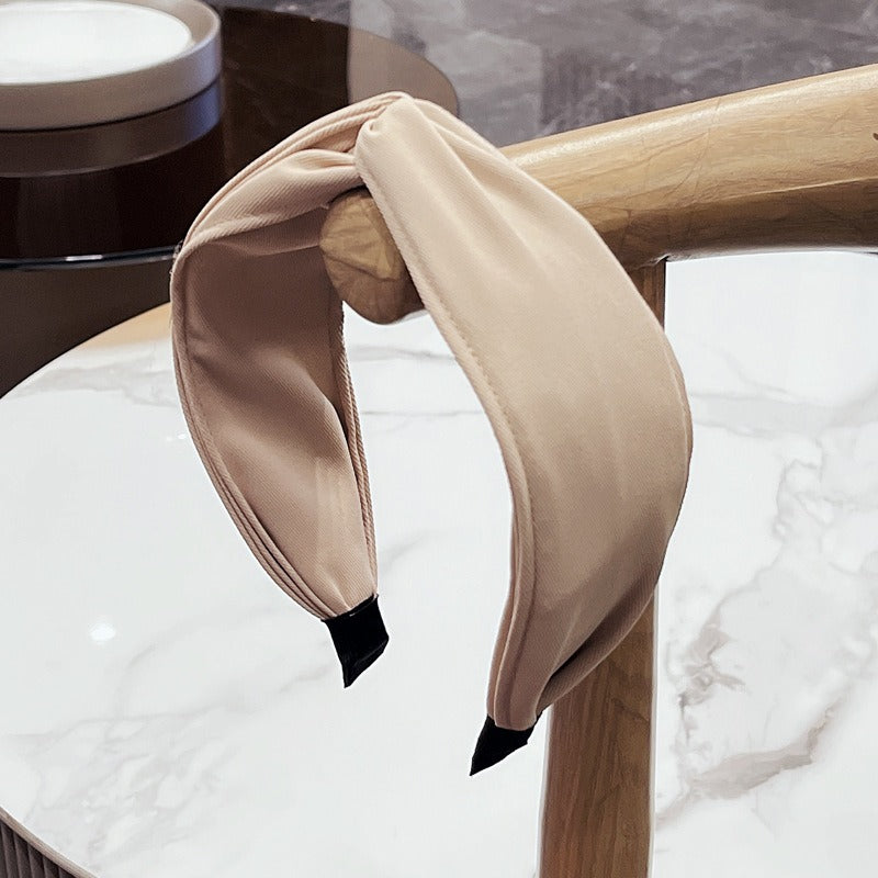 Fashionable fabric cross bow headband