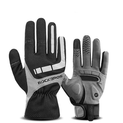 Black and gray gloves with text highlighting features on a white background