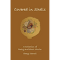 Covered in Shells: A Collection of Poetries and Short Stories - Paperback