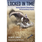 Locked in Time: Animal Behavior Unearthed in 50 Extraordinary Fossils - Hardcover