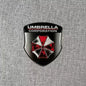 Resident Evil Umbrella Corporation Metal Badge