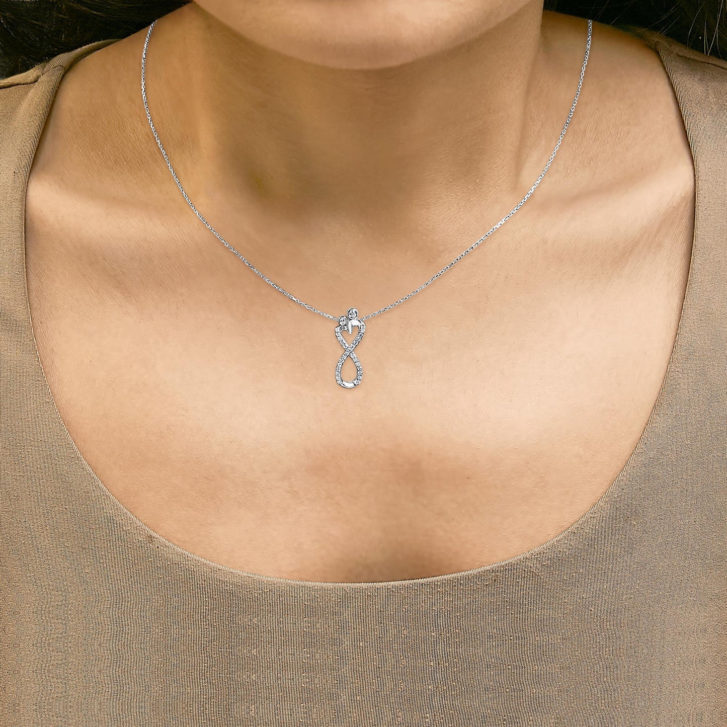 Diamond Infinity Pendant Necklace in Sterling Silver – 0.25 Cttw