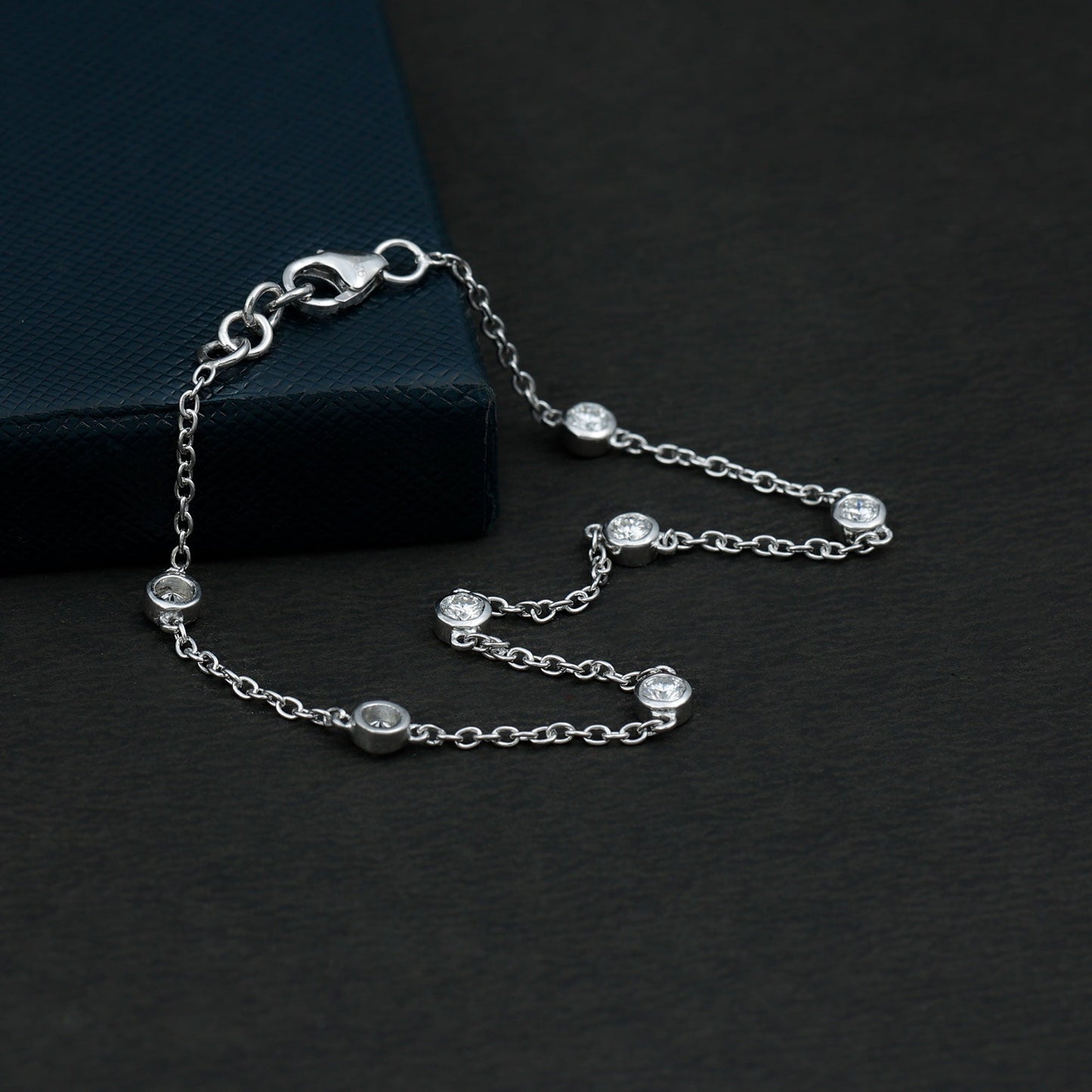 Round Cut Certified Moissanite Chain Bracelet in Bezel Setting