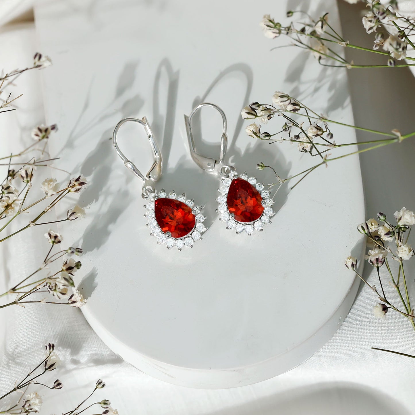 5 Carat Lab Grown Orange Sapphire Teardrop Earrings With Moissanite Halo Accents