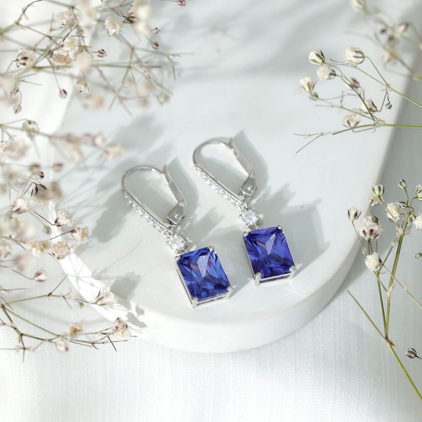 5.5 Carat Emerald Cut Lab Grown Blue Sapphire Drop Earrings in Silver