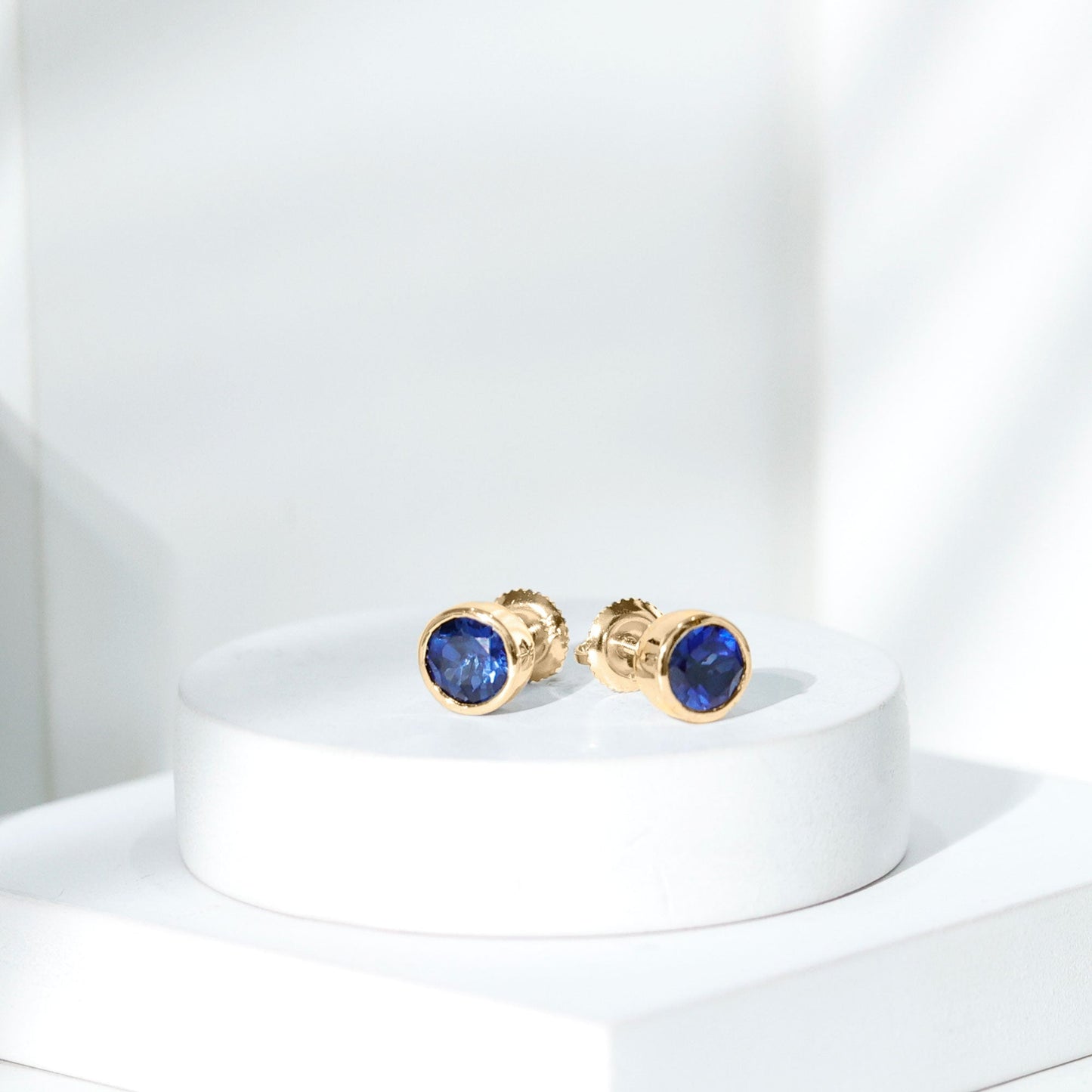 2 Carat Round Lab Created Blue Sapphire Stud Earrings in Bezel Setting