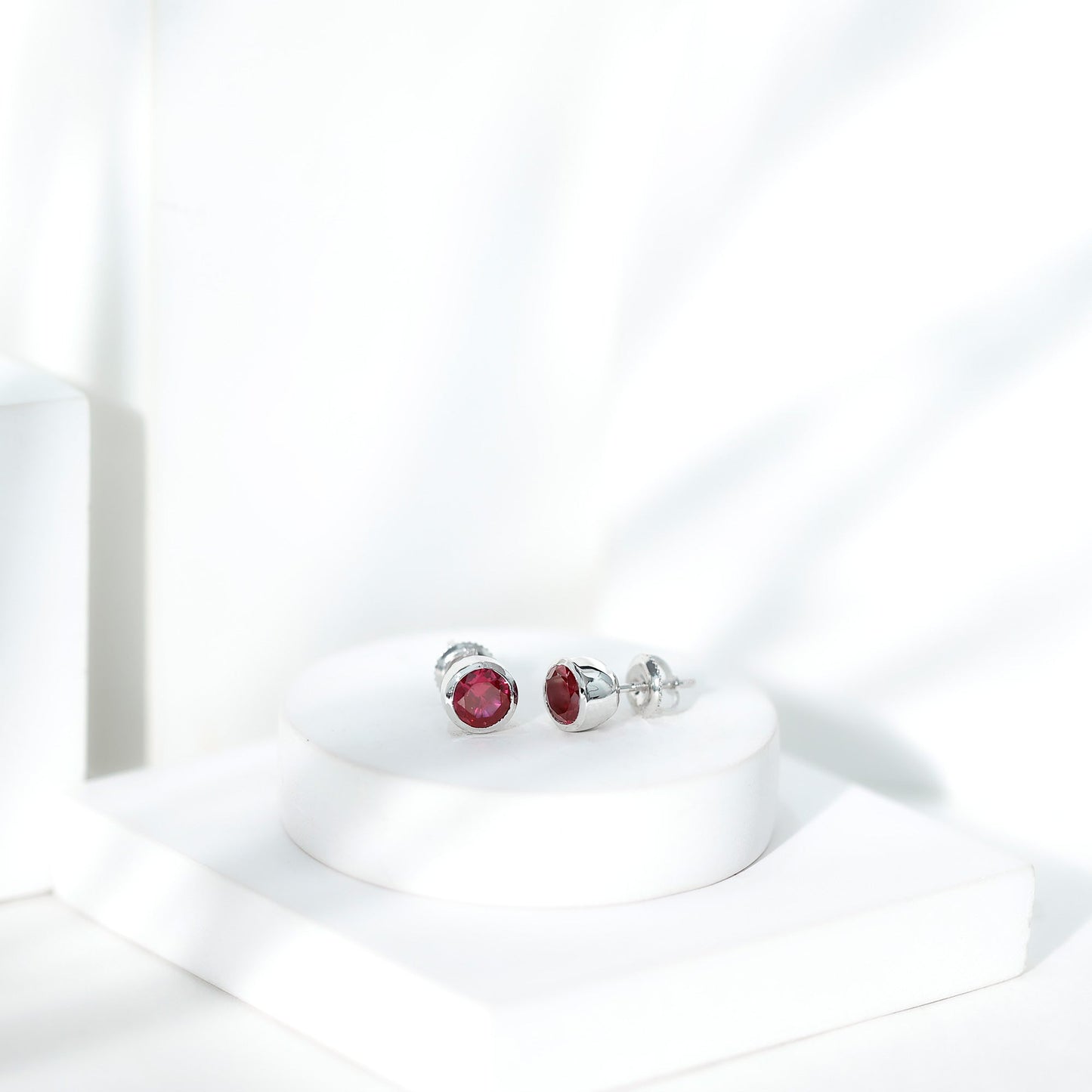 Lab Grown Ruby Solitaire Stud Earrings in Bezel Setting