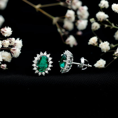 Lab Created Emerald Oval Stud Earrings with Moissanite Halo