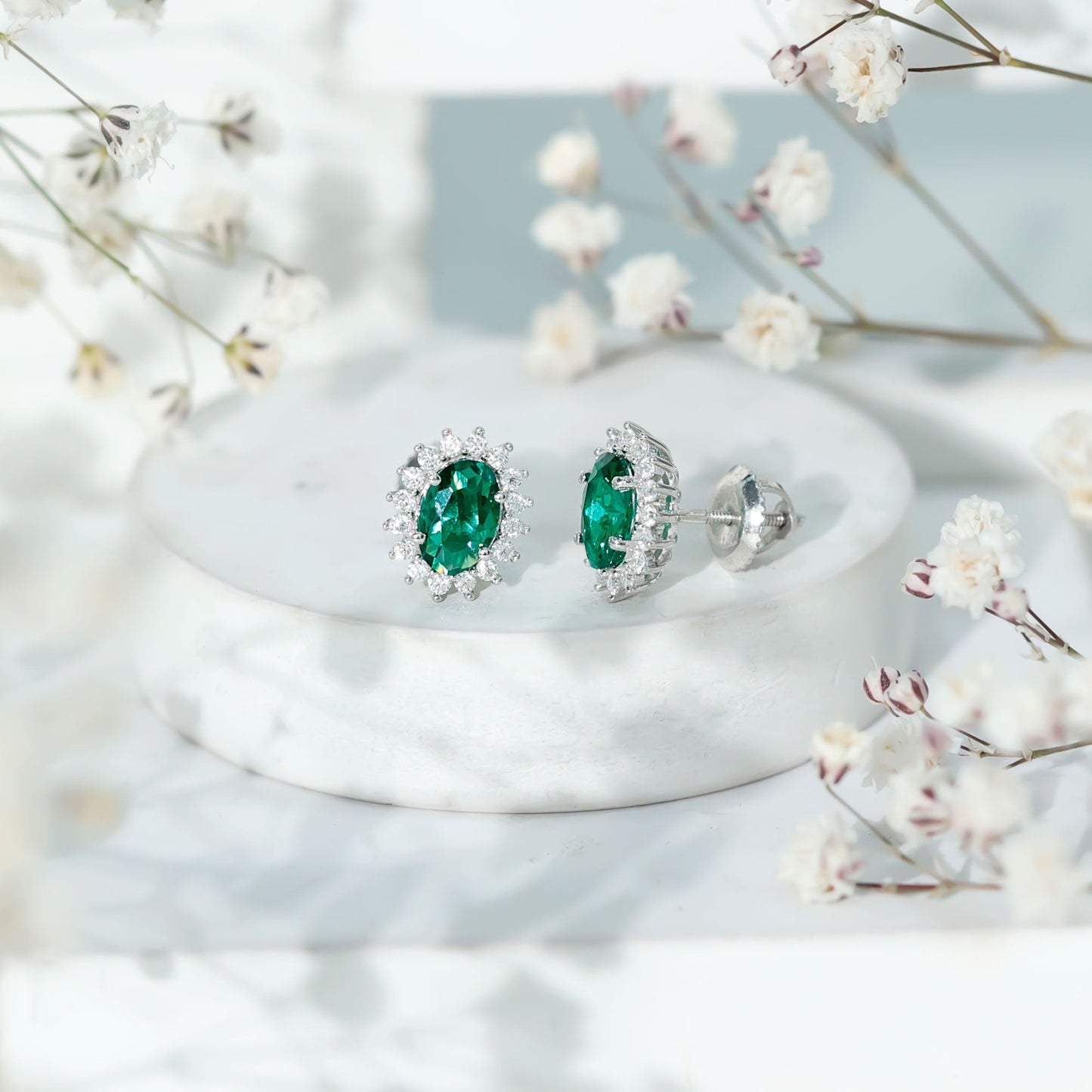 Lab Created Emerald Oval Stud Earrings with Moissanite Halo