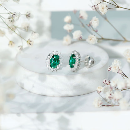 Lab Created Emerald Oval Stud Earrings with Moissanite Halo