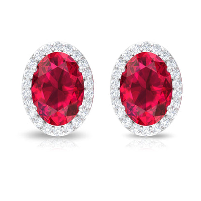 Lab Created Ruby and Diamond Halo Stud Earrings