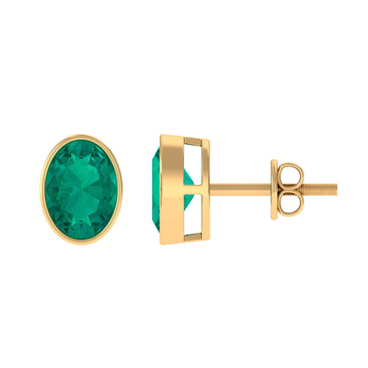 1.4 Carat Bezel Set Oval Cut Emerald Solitaire Stud Earrings