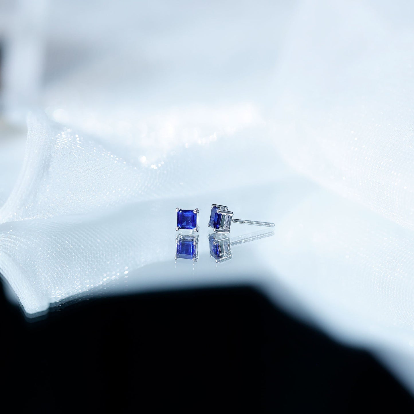 0.9 Carat Solitaire Blue Sapphire Princess Cut Stud Earrings