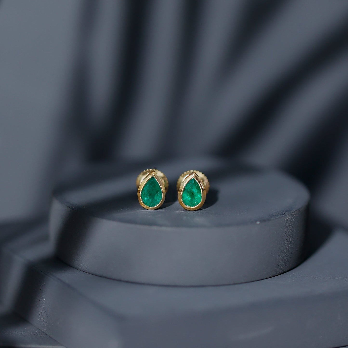 Genuine Emerald Teardrop Stud Earrings in Bezel Setting