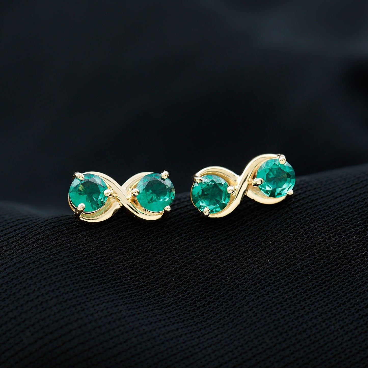 Lab Grown Emerald Infinity Stud Earrings