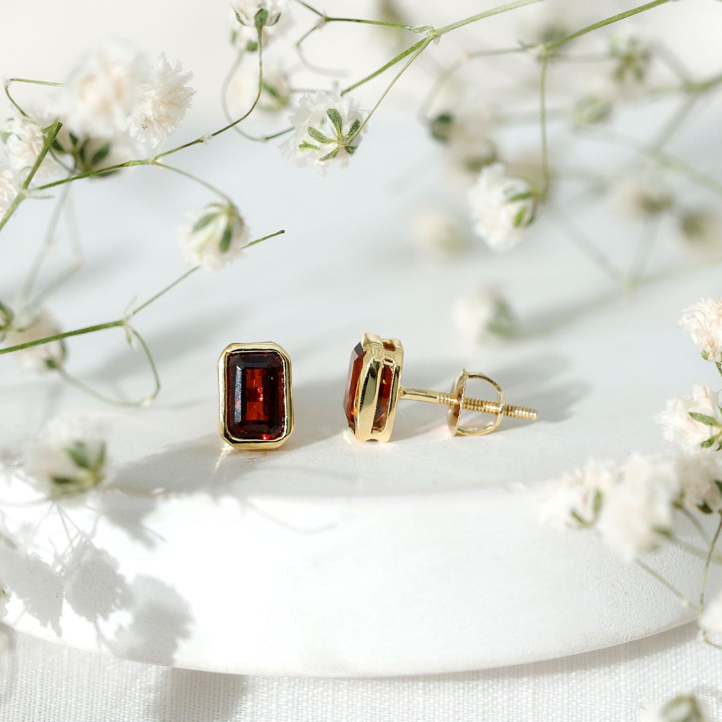 1.4 CT Emerald Cut Garnet Solitaire Stud Earrings in Bezel Setting