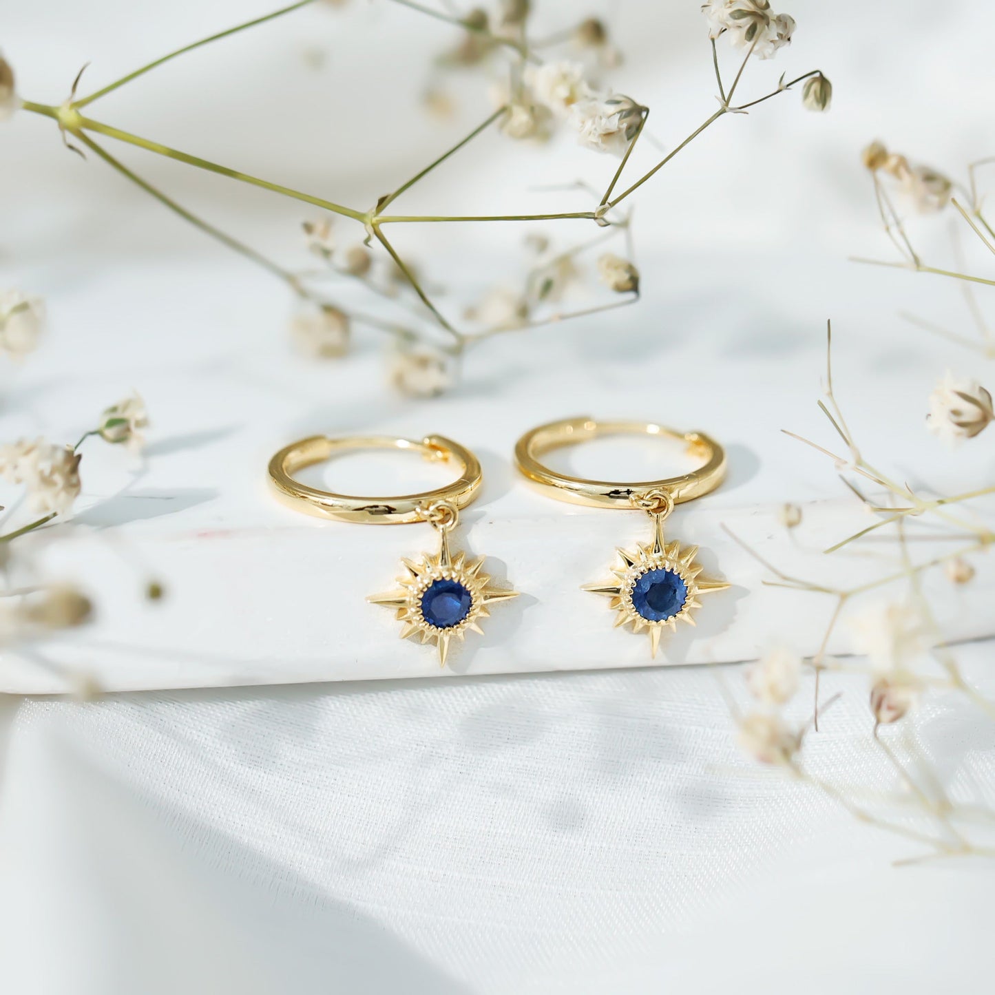 Bezel Set Blue Sapphire Sunburst Drop Hoop Earrings