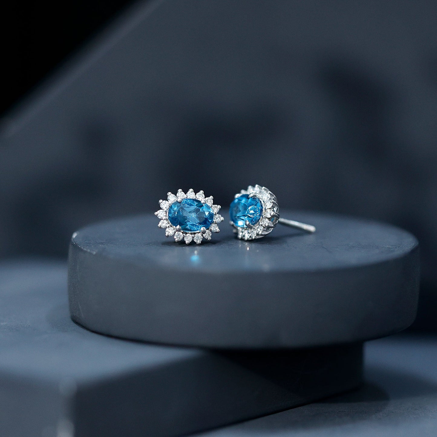 1.6 Carat Oval London Blue Topaz Stud Earrings with Diamond Halo