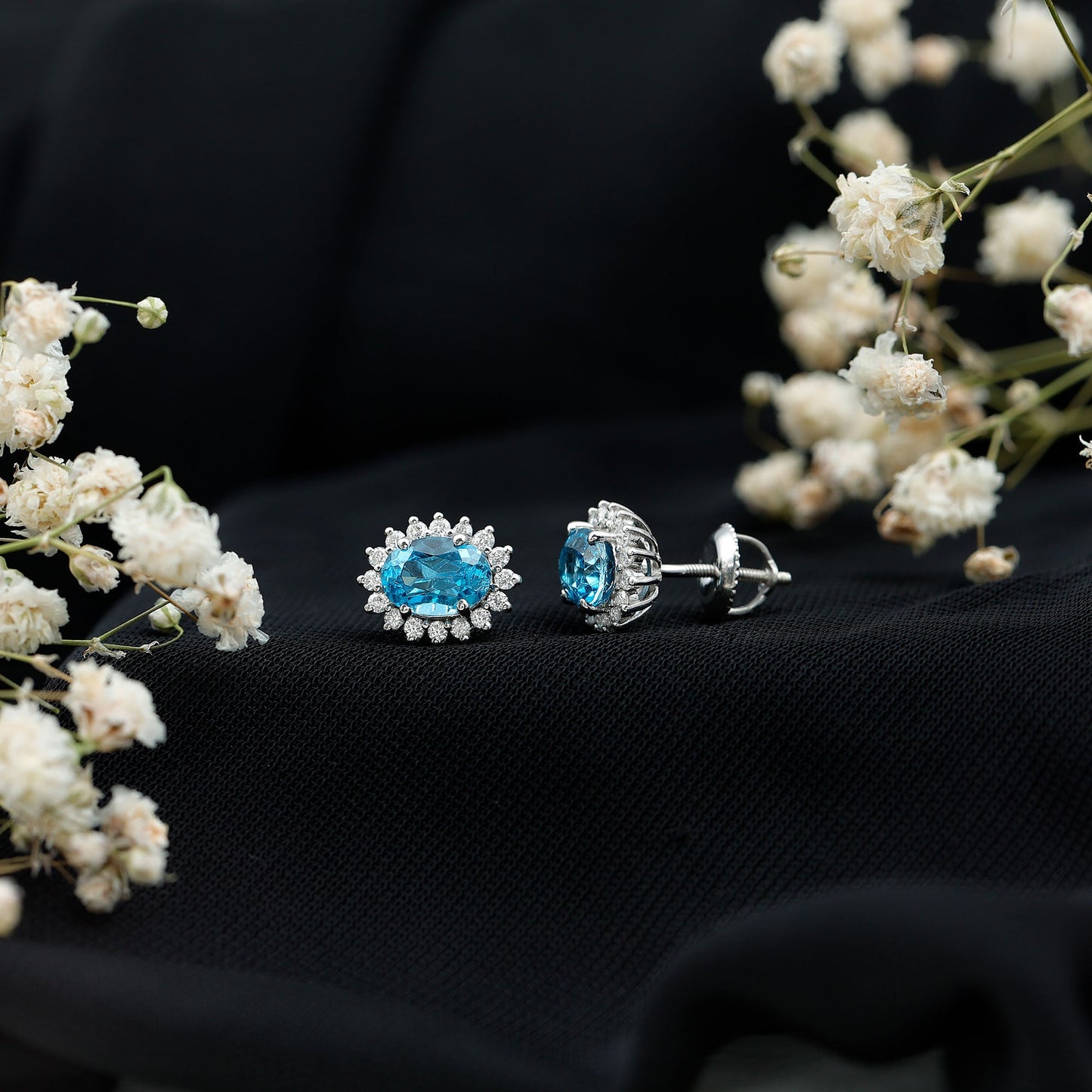 1.6 Carat Oval London Blue Topaz Stud Earrings with Diamond Halo