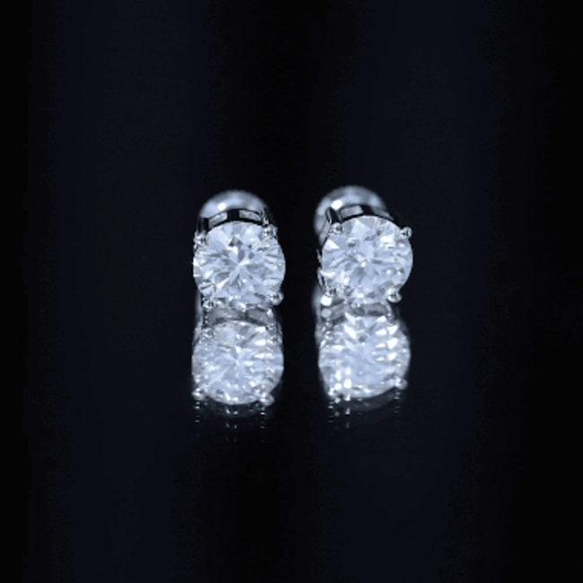 2.7 Carat Round Moissanite Studs in Claw Setting