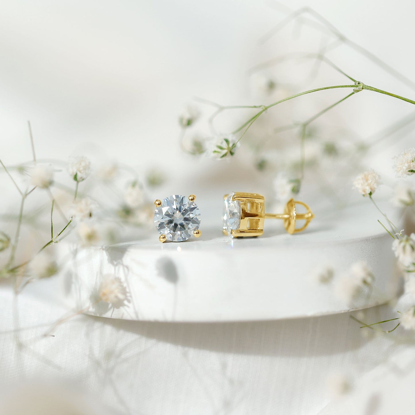 2.7 Carat Round Moissanite Studs in Claw Setting