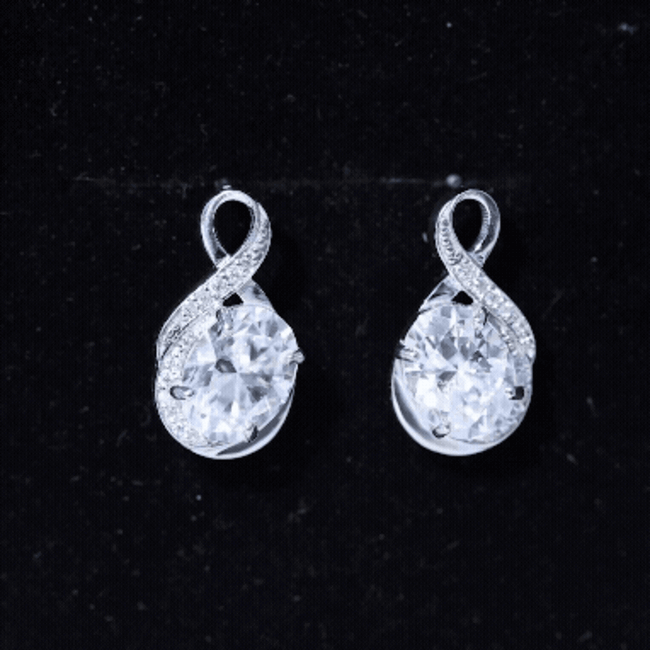 4 Carat Oval Cut Moissanite Infinity Stud Earrings in Silver